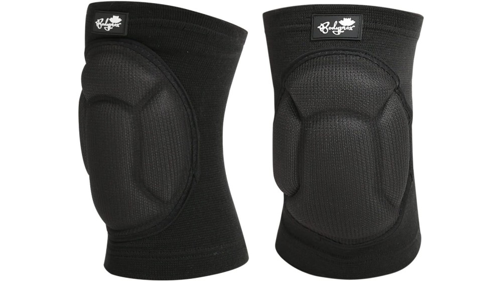 A pair of wrap-around black knee pads.